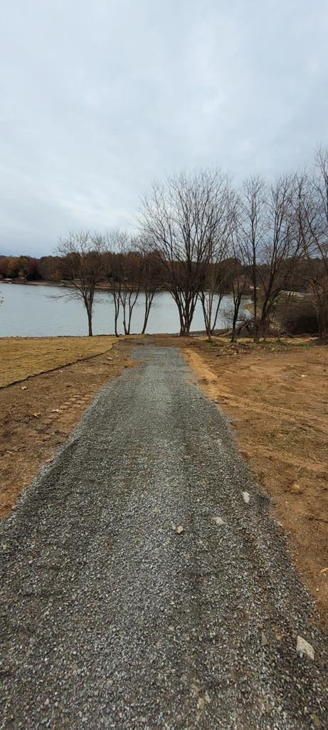 A newly installed gravel road heading out to the lake.